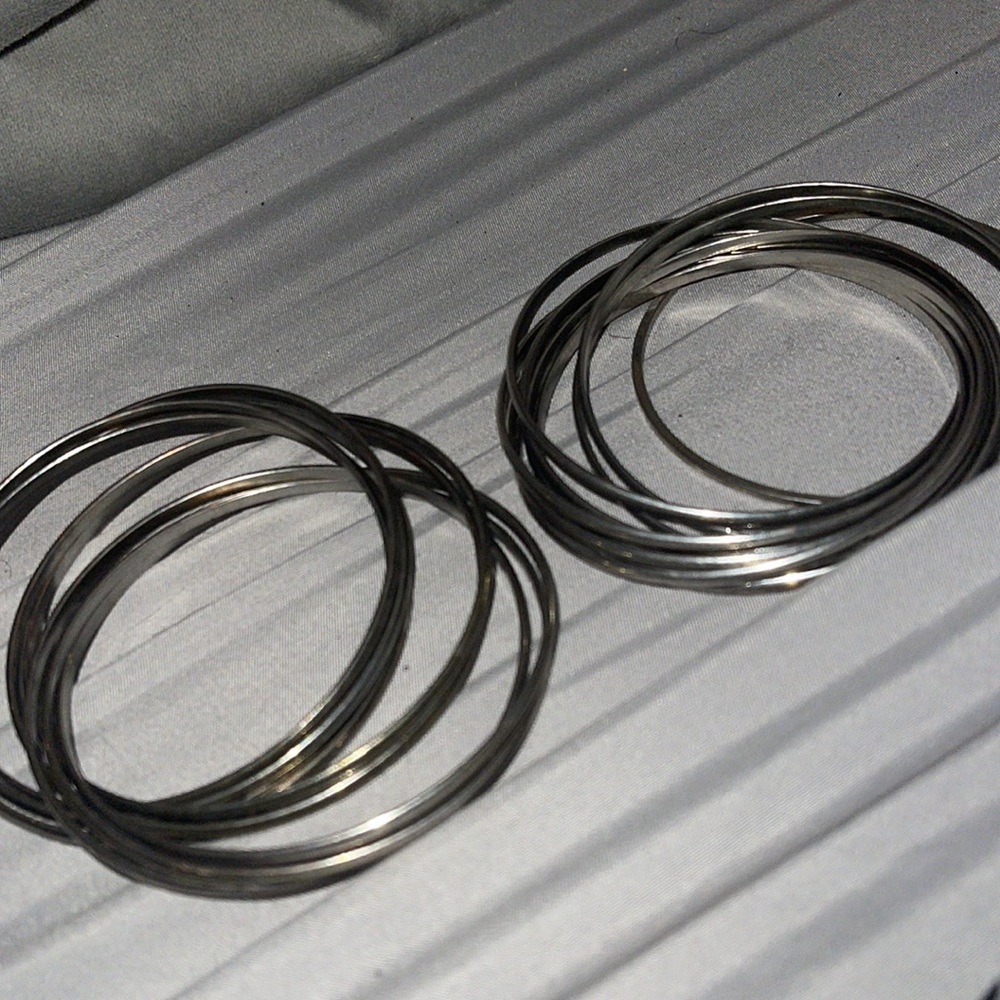 Silver bangles two sets costume jewelry it’s fashion slips over hand cute